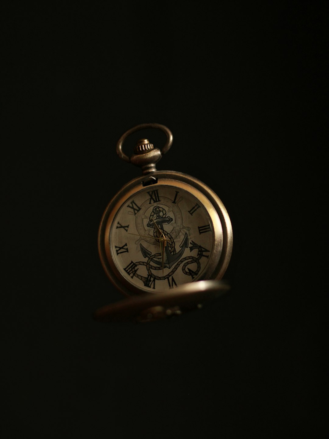 gold-and-silver-pocket-watch-njzb59xqwqm